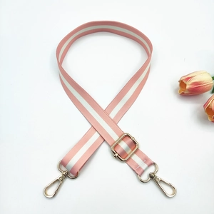 Pink and white striped adjustable bag strap with light gold lobster clasps and floral decor
