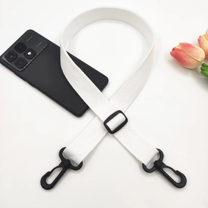 Adjustable white woven cotton strap with black metal hooks and slider for bags