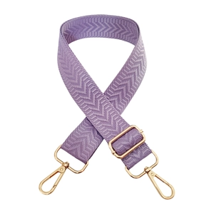 Detail of adjustable lavender chevron guitar strap with gold metal lobster clasps