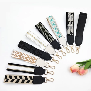 Multi-pattern woven wristlet strap collection with golden clips for bags and keys