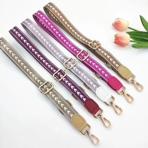 Adjustable colorful arrow pattern bag straps with gold hardware and leather ends