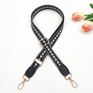 Adjustable 2.5cm wide black and white herringbone shoulder strap with gold metal hooks