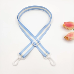 Adjustable blue and white striped shoulder strap with white plastic clips for bags