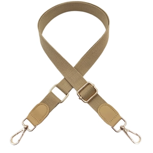 Adjustable khaki cotton canvas bag strap with leather ends and gold metal buckles