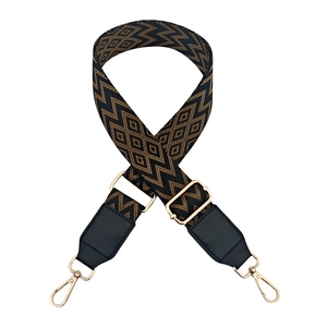 Adjustable 3.8cm geometric patterned strap with leather ends and gold metal hooks
