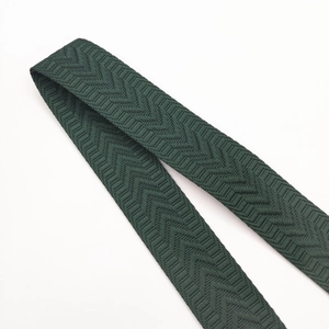 Close-up of 3.8cm dark green woven strap with high-density chevron pattern texture