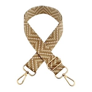 Detail of adjustable 3.8cm wide strap with beige diamond pattern and gold metal hooks
