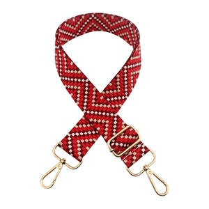 Detail of 3.8cm colorful striped bag strap with gold metal hooks and zig-zag pattern