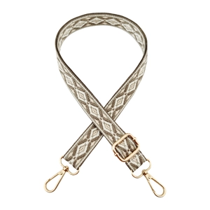 Detail of adjustable 2.5cm jacquard shoulder strap with gold swivel hooks and rhombus pattern