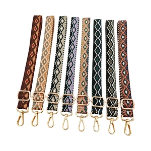 Adjustable crossbody straps with colorful diamond patterns and gold metal swivel hooks