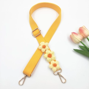 Handmade crochet daisy flower shoulder strap with yellow woven design and gold metal clips