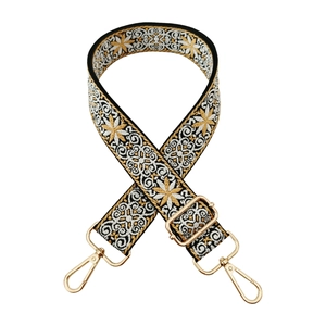 Adjustable 3.8cm ethnic jacquard bag strap with gold metal buckles on white background