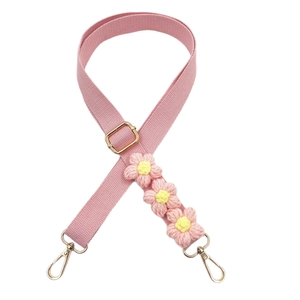Pink wide woven bag strap with handmade crochet flowers and gold metal hardware clips