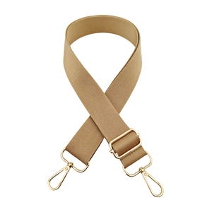 Detail of adjustable khaki nylon bag strap with polished gold-tone metal buckles