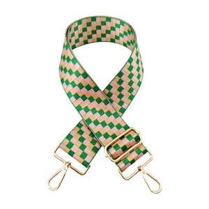 Adjustable wide checkerboard shoulder strap with green and pink woven patterns