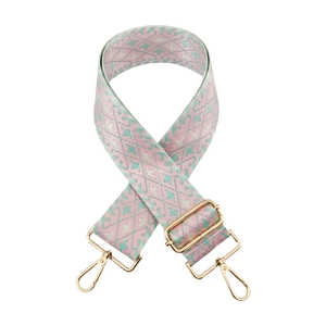 Detail of pink and mint green geometric jacquard strap with gold-tone metal hooks