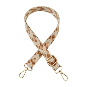 Close-up of adjustable woven strap with beige herringbone pattern and gold lobster claws