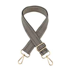 Adjustable 3.8cm wide woven bag strap with black and white wave pattern and gold hardware
