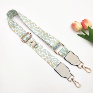 Adjustable mint green leopard print crossbody strap with premium gold hardware buckles