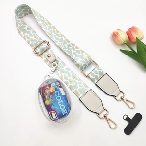 Leopard print crossbody phone strap with mint green fabric and gold metal buckles