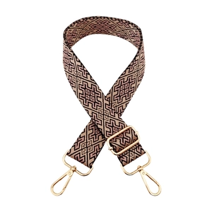 Detail of colorful geometric strap with gold lobster clasps and adjustable buckle