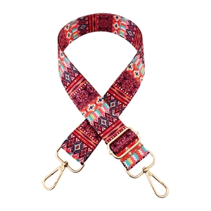 Adjustable bohemian style wide bag strap with colorful ethnic patterns and gold hardware