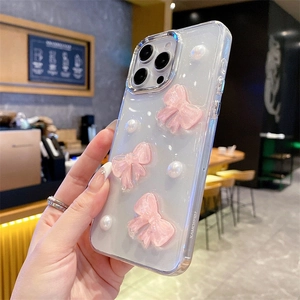 Glitzernde weiße iPhone Hülle mit 3D-Schleifen in Rosa und eleganten Perlen für Damen