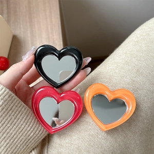 Heart-shaped folding phone grip mirror in black, red and orange glossy finish