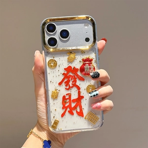 Detail of iPhone case featuring gold foil, Chinese lucky charms, and red calligraphy text