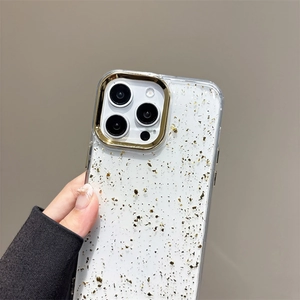 Detail of clear iPhone case with gold foil glitter and a premium metallic lens frame