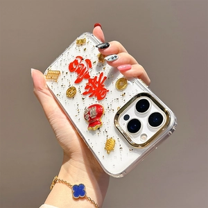 Detailed close-up of clear iPhone case with 3D gold foil lucky charms and Chinese coins