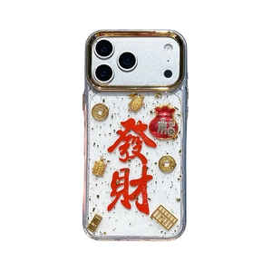iPhone 16 Pro clear case featuring gold foil, lucky coins, and red Fortune character