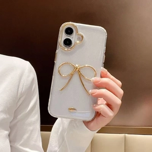 Clear glitter iPhone case with large gold hollow bow decoration and camera protection