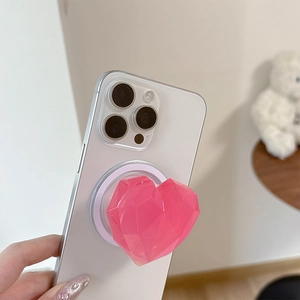 Pink laser heart magnetic phone grip with 3D geometric facets for MagSafe desktop stand