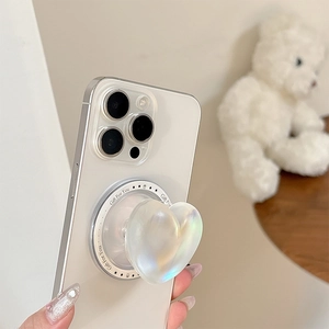 Iridescent heart-shaped phone grip with Gift For You print on a white smartphone