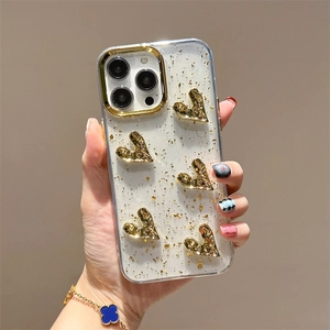 Custodia trasparente per iPhone con foglia d'oro, cuori 3D e protezione della fotocamera oro