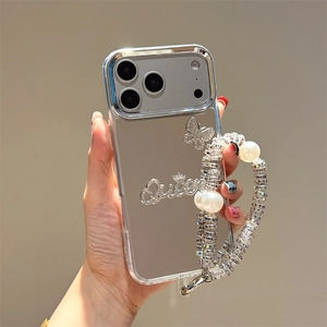 Detail of mirror iPhone case with crystal Queen letters, butterfly, and pearl strap