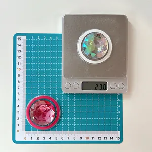Detail shot of multi-faceted crystal phone ring holders showing 23g weight and 4cm size