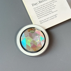 Macro shot of colorful magnetic phone grip with faceted laser cut crystal design