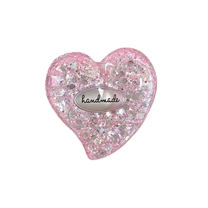 Pink heart sequin magnetic phone grip with handmade text on a clean white background