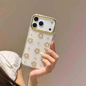 Golden floral glitter heart case for iPhone 17 Pro Max with 3D gold-edged flower details