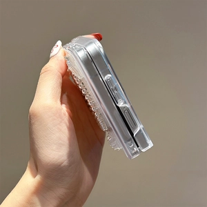 Close-up of side profile of transparent Samsung case with beaded pearl decorations