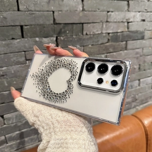 Detail shot of a Samsung Galaxy Ultra case with a silver rhinestone heart and metal lens frame