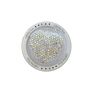 Sparkling rhinestone heart magnetic phone socket in gift box on white background