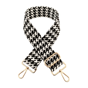 Detail of adjustable 5cm wide shoulder strap with black and white houndstooth pattern