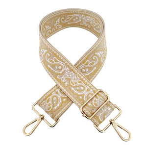 Adjustable wide woven shoulder strap with paisley pattern and golden metal buckles