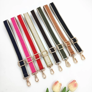 Adjustable woven shoulder straps in multiple colors with gold-tone swivel hooks