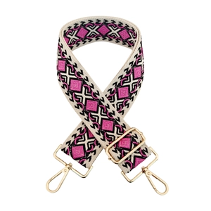 Detail of adjustable geometric diamond pattern wide shoulder strap with gold metal buckles