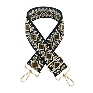 Detail of 5cm diamond jacquard ethnic bag strap with golden metal swivel hooks