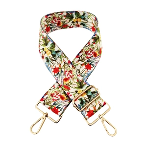 Detail of colorful floral 5cm wide replacement strap with gold metal lobster clasps